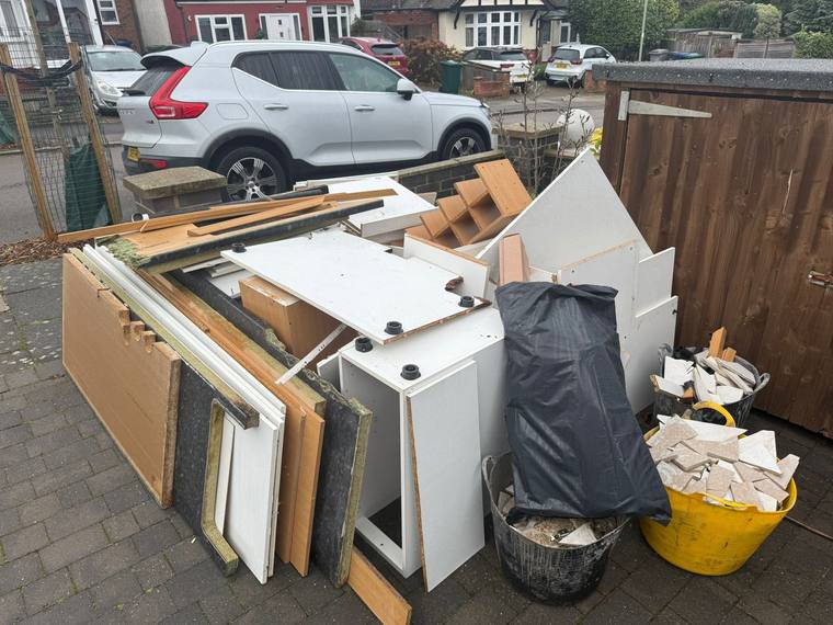 Pile of waste and old units before clearance