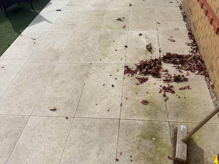 Dirty patio before jet washing